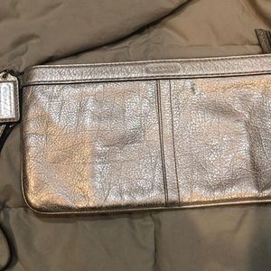 COACH wristlet metallic